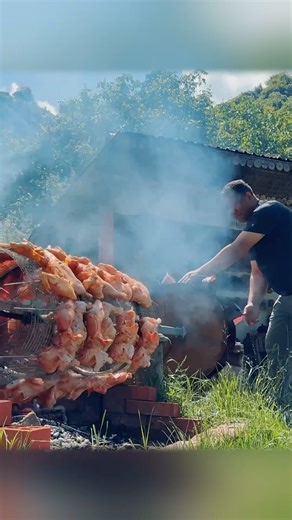 1.4M views · 11K reactions | Whole chickens slowly roasting on a giant spit in the wild – smoky aroma, crispy skin, and the true spirit of nature. Another rustic masterpiece from Wilderness Cooking. #wildernesscooking #outdoorcooking #rotisseriechicken #campfirerecipes #naturecooking #openfirecooking #bbqchicken #rusticfood #grilledchicken #foodielife #CookingInTheWild #traditionalcooking #firewoodflavors #countrystylecooking #chickenoverfire | Wilderness Grill | Facebook