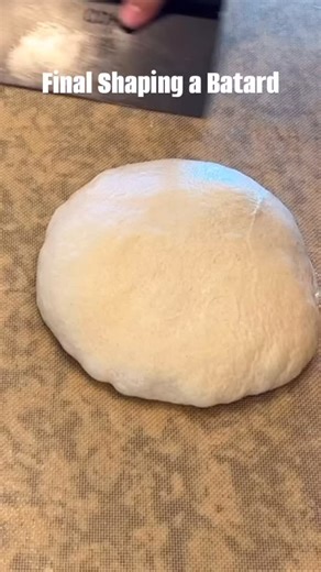 Final shaping a batard, with the classic Tartine fold, popularized by Chad Robertson. A strong final shaping method. 1. Envelope Fold 2. Stitch 3. Roll from the top down 4. Tuck 5. Into the banneton 6. Stitch or pinch, if needed Sometimes I roll from the bottom up in Step 3. Bottom up is a bit tighter rollup and often shows the spiral in the crumb. The final stitching/pinching is optional. This dough was really full of air and wanted to open up after shaping. #sourdough #sourdoughbaking #sourdou