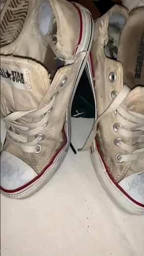 completely worn out girls converse sneakers for the trash can