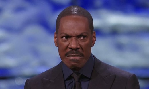 Eddie Murphy impersonates Bill Cosby in comedy award speech – video