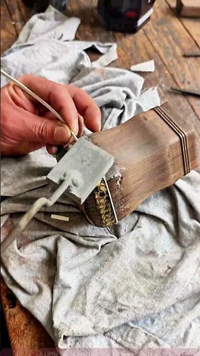 Handcrafted Restoration of a Traditional String Instrument - Detailed Headstock Repair Process