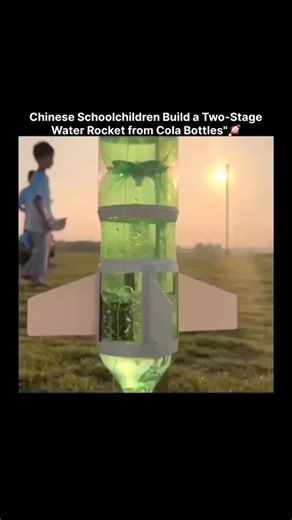 𝙒𝙊𝙍𝙇𝘿 𝙒𝙄𝘿𝙀 on Instagram: "The video captures a group of Chinese schoolchildren launching a homemade two-stage water rocket assembled from plastic cola bottles. Powered by compressed air and water pressure, the rocket ascends, performs stage separation during flight, and deploys a parachute for recovery, demonstrating principles of propulsion, staging, and basic aerodynamics through low-cost materials. The footage first gained widespread attention in mid-July 2025, following an initial s