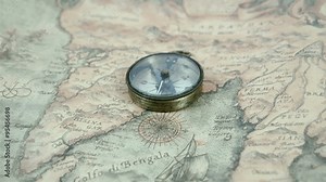 Zoom in view of the compass on the map. Used for navigating on the sea