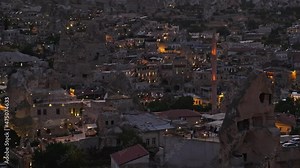 Cappadocia city view at night and traditional houses, Cappadocia, Turkey.