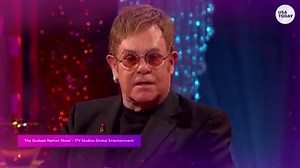 Eminem shocked the audience with a surprise performance at the Oscars. Then, he reunited backstage with his old friend Elton John. | USA TODAY Video