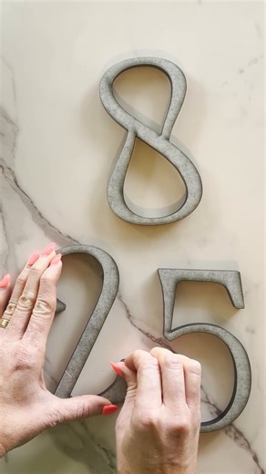 Introducing "Art", our newest house number style! 🎨 Watch the satisfying peel to reveal these gorgeous black fronts. Add a bold, modern touch to your home! 😍 Which number would you pick? Tell us below! | Dropcap Studio