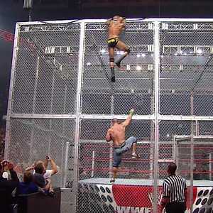 169M views · 3.8M reactions | John Cena & Randy Orton brawled on top of the Hell in a Cell structure on WWE Raw! ⛓ | WWE | Facebook