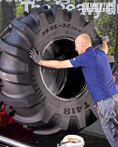 2.7M views · 3.9K reactions | Workers swap out tires almost as big as they are with the help of a tire-changing machine.  ️ Corghi | Interesting Engineering | Facebook