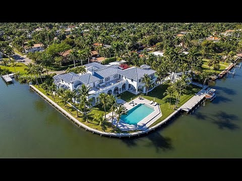 $16,500,000! Stunning Florida Mansion sitting on triple corner lot offers spectacular water views