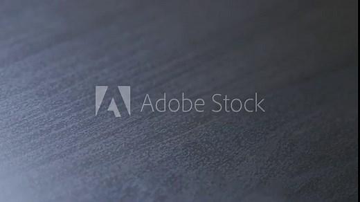 Modern table dark oak wood grain texture 4K 2160p 30fps UHD slow tilting footage - Dark wooden plank surface texture 4K 3840X2160 UHD tilting video