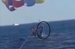 Worlds first shark attack while parasailing caught on video?
