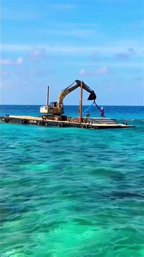 Pile Unloading to Sea Using Barge | Marine Construction Process #marineconstruction #marinepiling