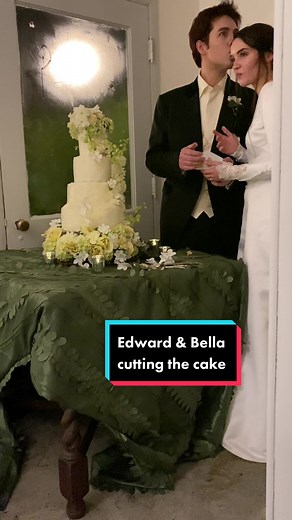 Edward & Bella cutting the wedding cake. This Twilight wedding reenactment was held in Forks this month for content and fun. If you don’t have anything nice to say then move along. @jamieakelley @samantharosebaldwin #twilight #twilightwedding #bellacullen #edwardcullen #twilighttiktok #breakingdawn