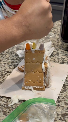 Do yall still build gingerbread houses ?👀 we had fun building our gingerbread houses 🏠 #gingerbreadhouse #FamilyNightDoneRight | Home With Coiya