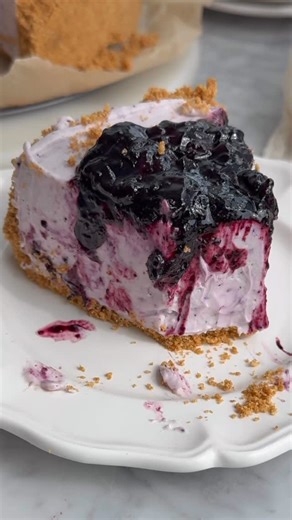Britt Berlin | easy vegan recipes for home bakers on Instagram: "NO BAKE Vegan Blueberry Cheesecake!! Just 8 simple ingredients, no tofu, no nuts, dairy free, and just the most lush, creamy blueberry cheesecake batter topped with homemade blueberry preserves on top!! COMMENT “blueberry cheesecake” or “recipe please” and I’ll send you the full recipe. Or find it on my site (link in my profile) or search “no bake blueberry cheesecake” for the recipe! Enjoy!! 💫"