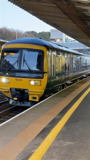GWR class 165 roars out of Dawlish Station with the Exmouth to Paignton service 165101 DMU