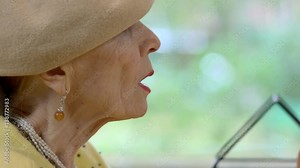 Senior woman talking. Side view of female face. Just do as I say.