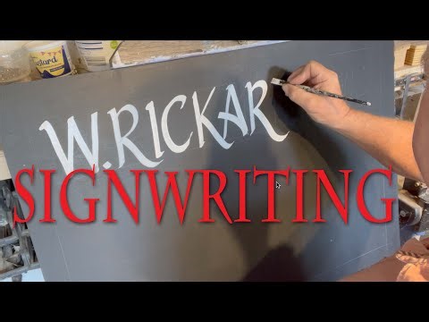Signwriting demonstration using acrylic pens and brushes.