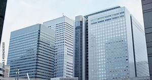 City, building and texture with exterior for architecture, infrastructure and location in Japan. Outdoor, wall structure and design with modern facade for corporate office, apartment and downtown