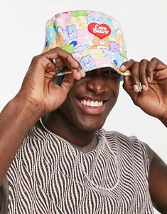 ASOS DESIGN Care Bears reversible bucket hat in all over print | ASOS