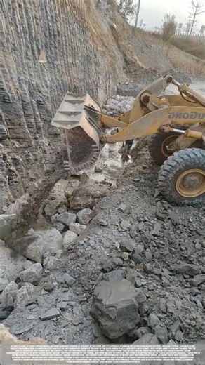 Slope protection loader pours concrete