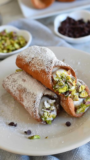 ✨Authentic Cannoli Siciliani✨�I’m super excited to share this recipe with you! There’s something truly irresistible about these crispy, golden shells filled with sweet, creamy ricotta and tiny bursts of chocolate. 🍫🍊�And even more exciting - It’s also one of the very first recipes from my NEW cookbook Never Say Never to Dolce, now available for preorder! 📖💛�Make sure to grab your copy in time for the holidays — because you should never say never… to dolce! 🇮🇹 Cookbook and recipe links also