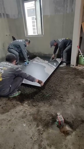 Installation of large ceramic tiles on building floors #shorts