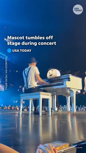 New York Mets' mascot Mr. Met fell off stage with his tambourine during a surprise appearance at The Lumineers’ concert at Citi Field. | USA TODAY