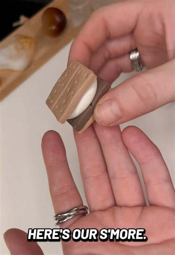 How to make a s’mores keychain out of Polmer Clay. I’ve decided to start making tutorial videos that are beginner friendly. My phone ran out of storage filming this video, so I remade the graham crackers because the first ones were too thin. If there’s any steps you are wondering about please comment below 🫶🏻☺️ Happy crafting! #polymerclay #polymerclaytutorial #smoreskeychain #smores #polymerclaybeginner