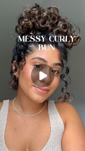 Keisha Kira on Instagram: "quick messy bun tutorial 🥰 how to⤵️ when I say quick I mean 30 secs - 1 min once you get the hang! I literally do this on the go 😅 ✨ section BANGS away ✨ gather rest of hair into LOOSE ponytail 🧞‍♀️ so you don't stretch out the roots ✨ take ur fave scrunchie / one that blends to your hair colour if u can ✨ loop round ponytail ONCE ✨ on second loop, pull pony tail through only HALF way and towards face ✨ this forms a lil half bun at the back of your head and a lil mo