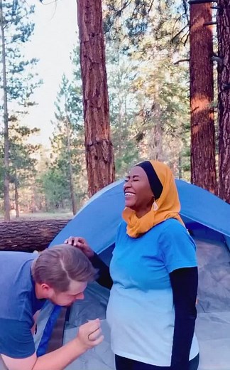 Camping Moments: Man and Woman Explore Nature Together