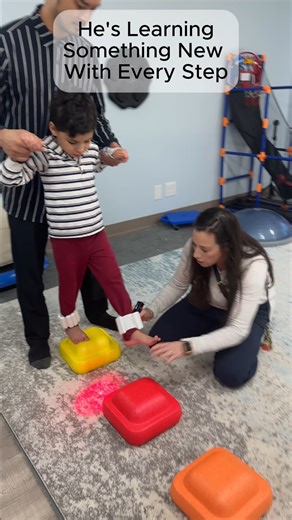 Erinn Askin MA OTR/L,PAMs on Instagram: "This is more than just a fun activity. It’s about how the brain learns through movement, balance, and sensory input. As he steps, his nervous system is getting real-time information from his feet, joints, and eyes. The laser provides gentle input that helps support regulation and organization in the nervous system, so the brain can better process what the body is doing in that moment. When the brain feels safer and more settled, movement often becomes eas