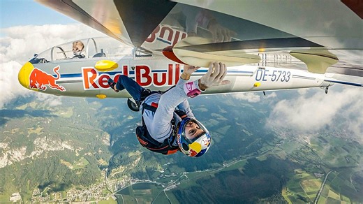 Climber scales outside of plane mid-flight in world-first stunt