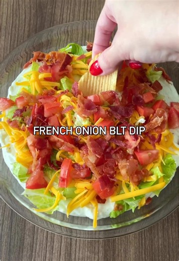 French Onion BLT Dip: When your favorite sandwich meets your favorite dip—crispy, creamy, crave-worthy. 🥓🧅 You’ll need… 1 tub of Dean’s French Onion Dip Cut romaine lettuce Shredded cheddar cheese Chopped tomatoes Cooked bacon 1. Add Dean’s Dip to the bottom of a medium serving dish. 2. Top with lettuce, cheese, tomatoes and bacon! Chill in the fridge until ready to serve. #deansdip #fyp #blt