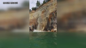 New perspective of cliff falling very close to Pictured Rocks kayakers