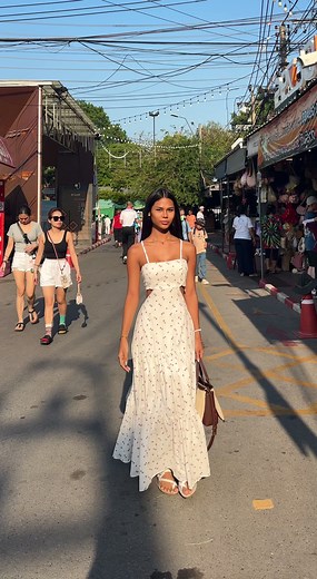 Exploring a Bustling Street Market in Floral Fashion