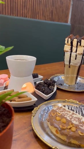 FOODIE BOY VENKY on Instagram: "📍Location - Vijayawada MG Beside Croc'sShowroom Desserts Factory . . Do follow @foodie_boy_venky for more videos . . Must try items -------------------- Death By chocolate Chocolate Fando The Melting Cone Triple Chocolate Kunafa Tiramisu Latte Mojito Tower . . Combos offers -------------------- Burger,French fries, Mojito 199 Burger, Ice cream, Cool Drink 149 Burger, Pastry ,Cool Drink 149 Pizza, chicken popcorn, Mojito 269 . . Cake offer's ---------------- For 1