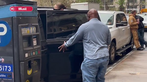 Jennifer Lopez steps out in a skimpy grey crop top and low-rise sweatpants