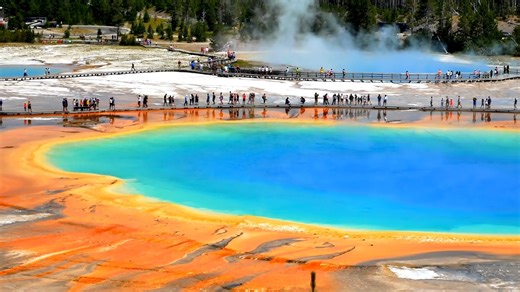 Grand Prismatic Spring: Yellowstone’s Living Rainbow It’s one of the most photographed places in Yellowstone — and for good reason. Grand Prismatic Spring looks like something from another planet. It’s the largest hot spring in the United States, wider than a football field and deeper than a 10-story building. Those unreal colors aren’t just for show. The deep blue center is near boiling, too hot for life, while the edges shimmer in greens, yellows, and oranges thanks to heat-loving microorganis
