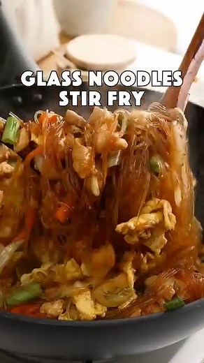 Family favourite glass noodles recipe. Super easy, loaded with flavour, and absolutely delicious! Ingredients 100g/3.5oz glass noodles/cellophane noodles 200g/7oz chicken breast or thigh 2 eggs 1 carrot 100g/3.5oz cabbage Half onion 2 cloves garlic 1 red chilli pepper 2-3 tbsp cooking oil For stir fry sauce 3 tbsp light soy sauce ( all-purpose ) 1.5 tsp dark soy sauce 2 tbsp oyster sauce 1 tsp sesame oil 1 tbsp sugar | Khin's Kitchen