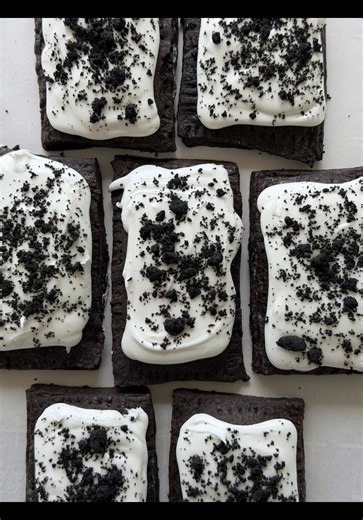 Homemade Cookies and Cream Poptarts Black cocoa in the dough Vanilla bean cream cheese filling Royal icing Homemade cookie crumbles #baking #poptarts #cookies #oreo #recipe