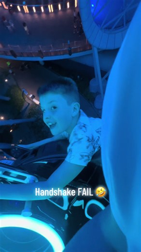 Handshake FAIL but look at how he NAILED the point!!!! #disneyworld #tron #fail #handshake #fyp