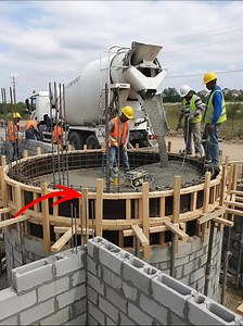 This image shows a reinforced concrete bond beam (ring beam) being cast on top of masonry walls—a critical structural step in low-rise construction. | Civil engineering