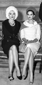Capucine and Claudia Cardinale sitting on bench together in front of crowd in a scene from the film 'The Pink Panther', 1963 🥰💕🌟🎥 | Classic Film