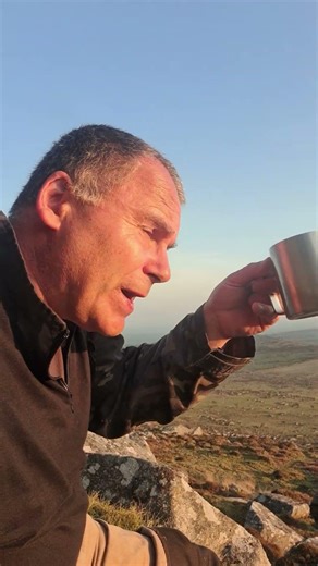 Wild camping on the high ground with a cup of coffee.