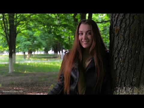 Beautiful Ksenia is smoking cork 100mm cigarette