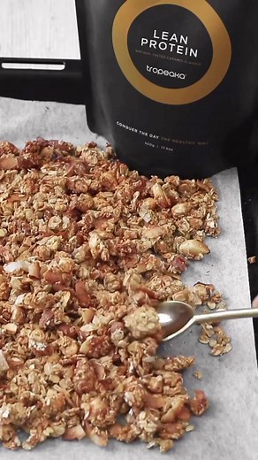 Salted Caramel Protein Granola 🙌Store bought granola can be filled with processed sugar, preservatives, and a whole lot of ingredients that we’re not a fan of. 😧 Skip it, save some money and make this easy as recipe at home!Ingredients: 〰 1.5 cups rolled oats 〰 1 cup mixed nuts & seeds 〰 1/2 cup shredded coconut 〰 2 tbsp Tropeaka salted caramel lean protein 〰 1 tsp cinnamon 〰 1/4 tsp salt 〰 2/3 cup rice malt syrup. Method: 1. Preheat oven to 160*C (320 degrees Fahrenheit). Line a baking tray w