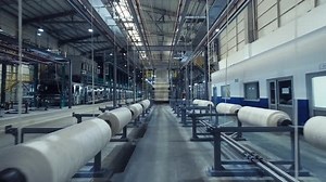 Textile factory. Denim Fabric Production. 4K