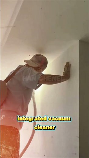 This man is sanding the wall using a wall sander.#shorts #construction #shortvideo #fyp