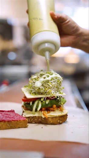 we’re all about the BTS 👏🏼and by that we mean Behind The Sandwich, duh! this year, we’re celebrating National Sandwich Month by showing you exactly how we create your favorite menu items. because the EAT HAPPY ethos doesn’t just happen magically — it starts in our kitchens!and if you’re craving The Happy Hippie after this video, don’t worry - we got you! 🌈🥪#mendocinofarms #eathappy | Mendocino Farms